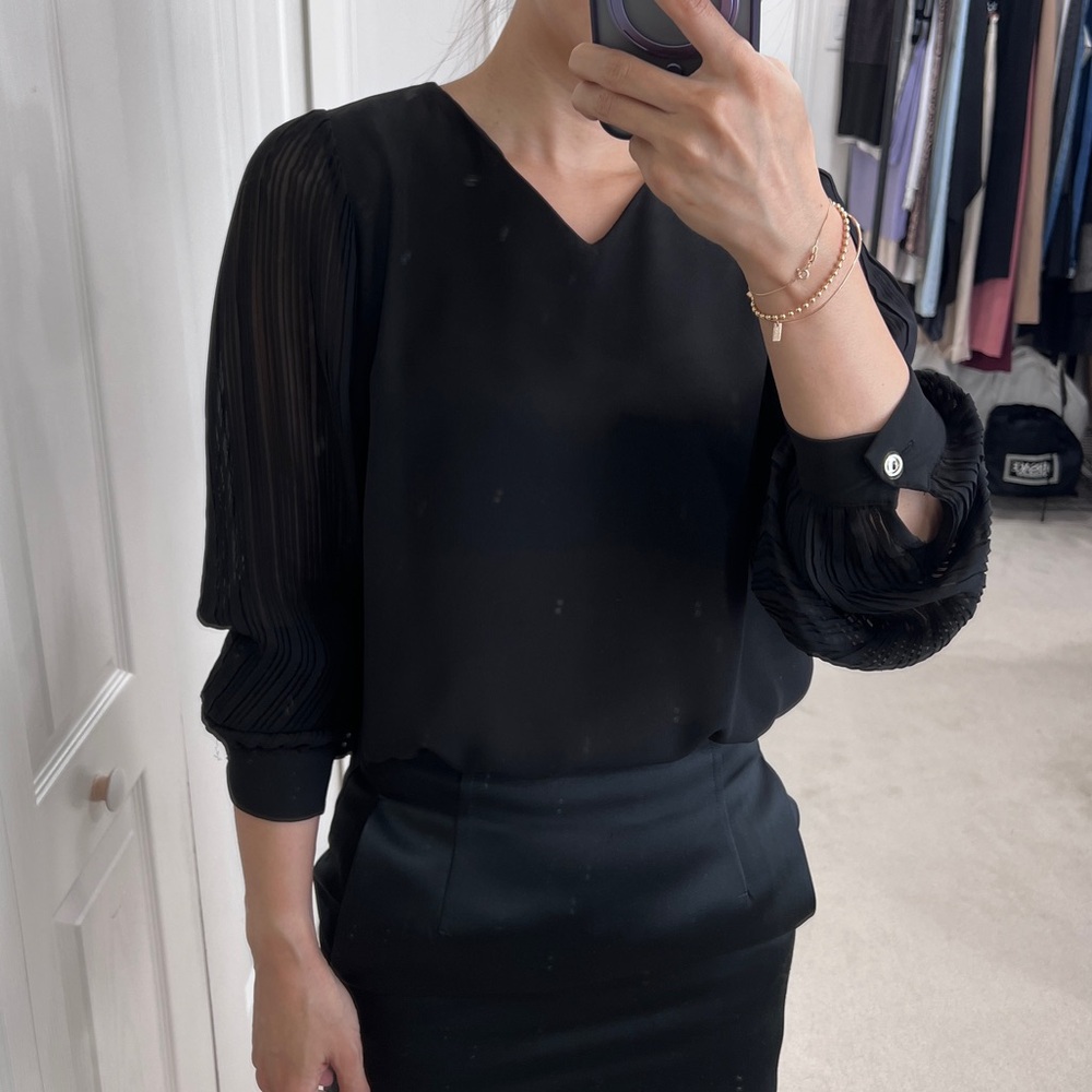 Black pleated blouse